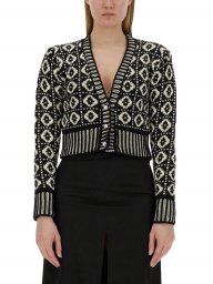 Укороченный жакет спицами жаккардовым узором