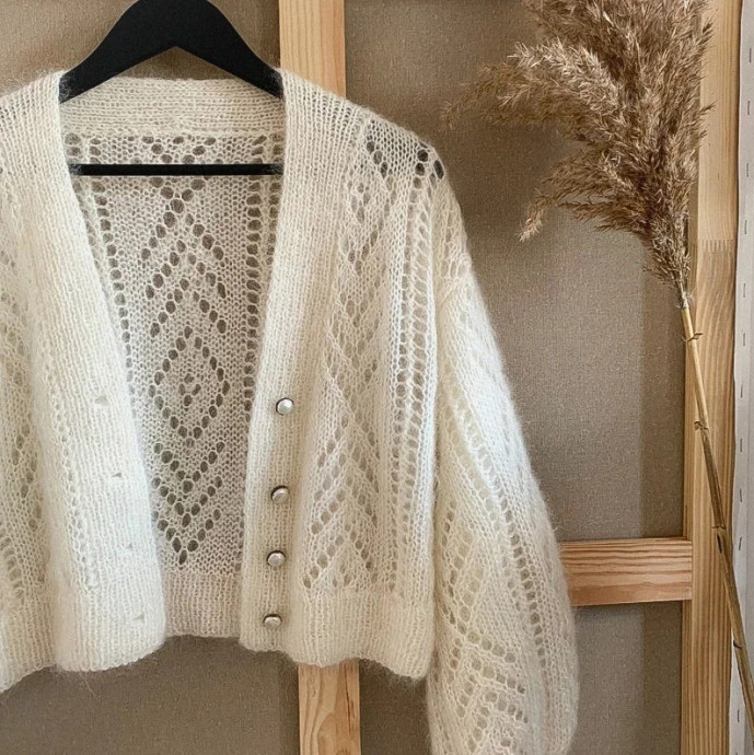 Укороченный кардиган с геометрическим узором. Укороченный кардиган с геометрическим узором.