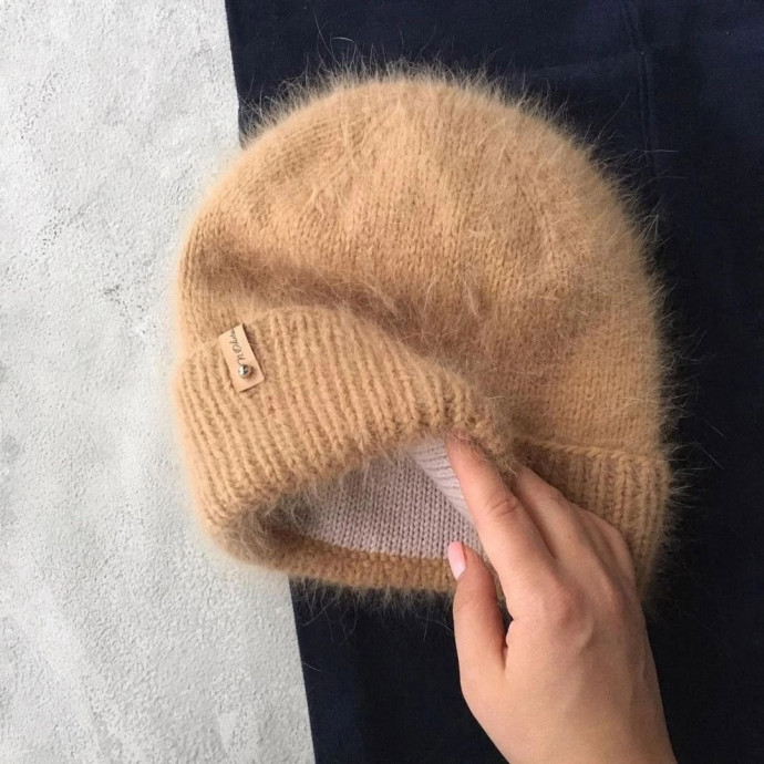 Тёплая двухслойная шапка из пуха норки и мериноса — роскошь и уют в одном аксессуаре