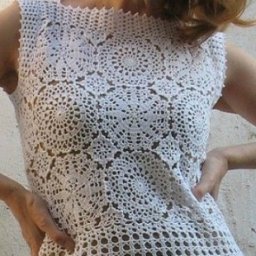 Белое платье мотивами крючком