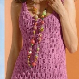 Необычное летнее платье, связанное спицами