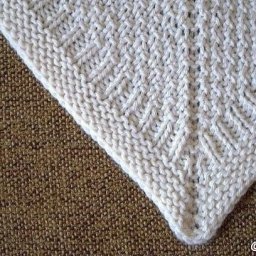 Теплая шаль спицами