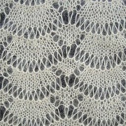 Тончайший ажурный узор спицами