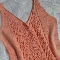 Оранжевый топ спицами