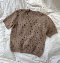 ​Летний женский топ, связанный спицами: идеальный аксессуар для стильного образа