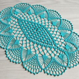 Бирюзовая овальная салфетка крючком