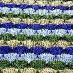 Узор « бантики» спицами