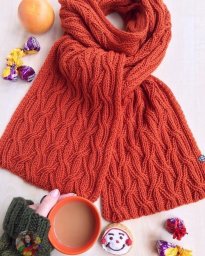 Κpacивый узop для вязaния шapфa cпицaми