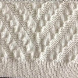 Симпатичный узор спицами