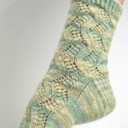 Ажурные тёплые носочки спицами