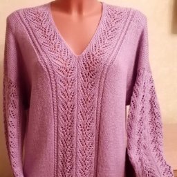 Красивая вещь с ажурным узором спицами