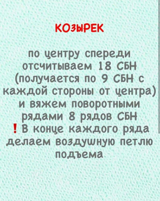 Серая шапка-ушанка из плюшевой пряжи — уют и стиль в одном аксессуаре Серая шапка-ушанка из плюшевой пряжи — уют и стиль в одном аксессуаре