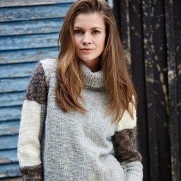 Симпатичный свитер спицами для любителей стиля 80х