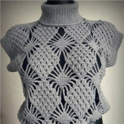 Комплект из безрукавки и юбочки, связанный крючком