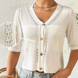 Лаконичная кофта на пуговицах с ажурной дорожкой и листьями