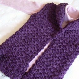 Очаровательный теплый жилет