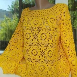 Яркая туника из вязаных мотивов