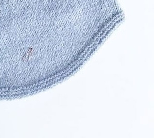 Как связать закругленный низ спицами