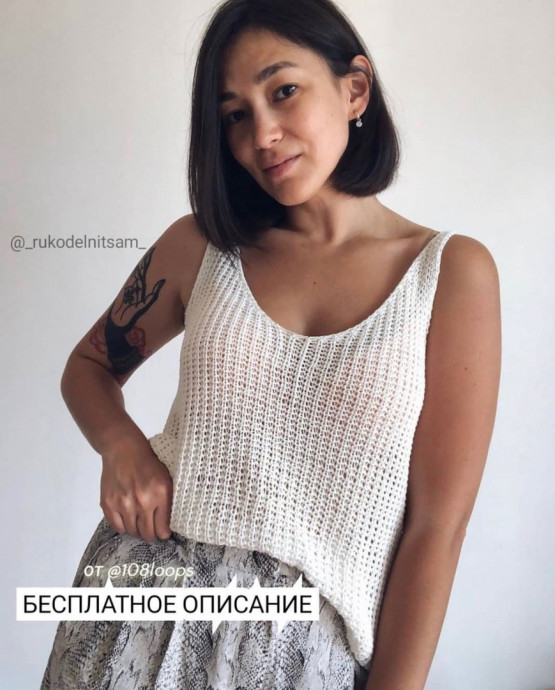 Лаконичный женский топ, связанный спицами Лаконичный женский топ, связанный спицами