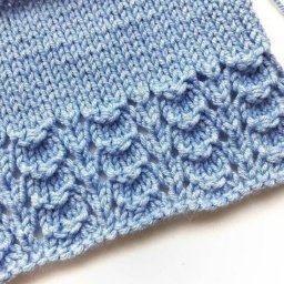 Красивое оформление низа изделий спицами