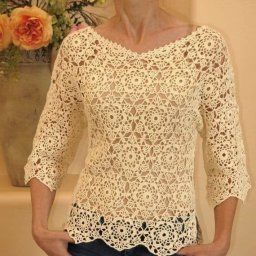 Очаровательная кофточка из вязаных мотивов