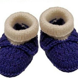 Уютные пинетки, связанные спицам