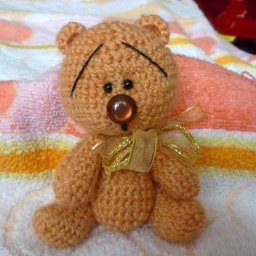 Немного грустный, но такой красивый мишка