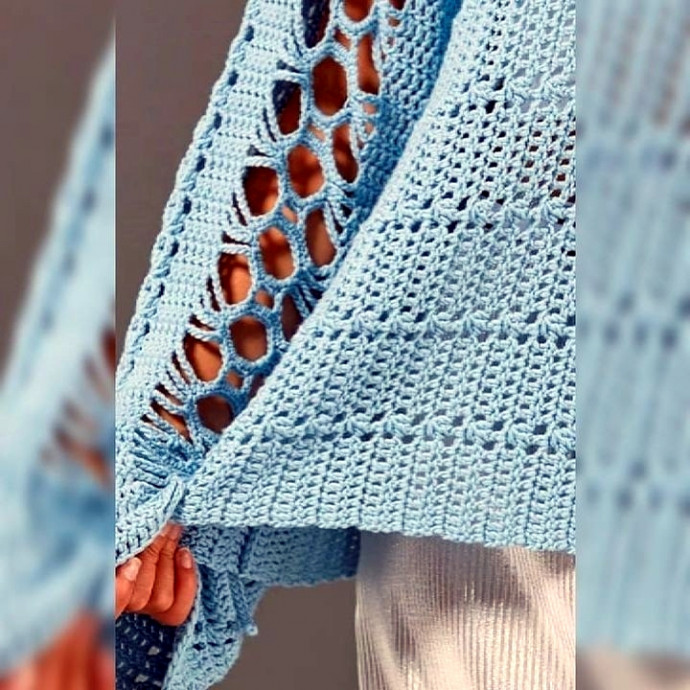 Красивый и нарядный пуловер от дизайнера Наташа Робардж