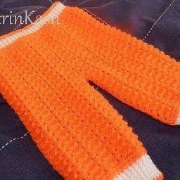 Детские штаны, связанные спицами