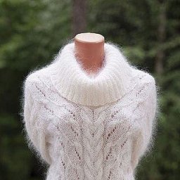 Нежный и теплый свитер спицами