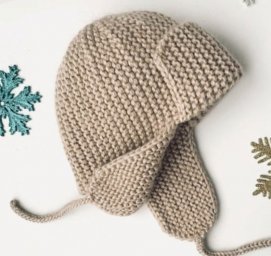 Уютная шапка-ушанка платочной вязкой