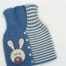 Детский жилет: универсальная модель, связанная спицами