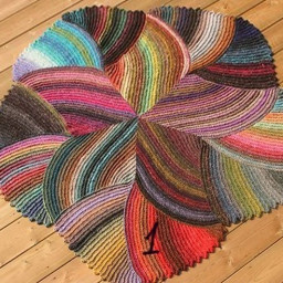 ​Красивый коврик спицами