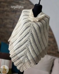 Шаль молочного цвета — утончённость, которая всегда уместна