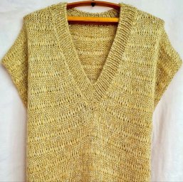 Вязаный жилет с пайетками — изысканный акцент в вашем гардеробе