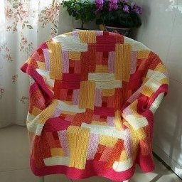 Необычный плед спицами