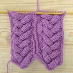 Интересная косичками спицами