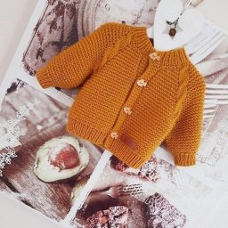 Горчичный жакет со жгутами на малыша