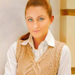 ​Жилет женский вязаный спицами