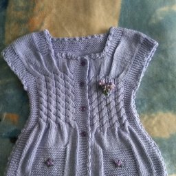 Вязаная жилетка для девочки