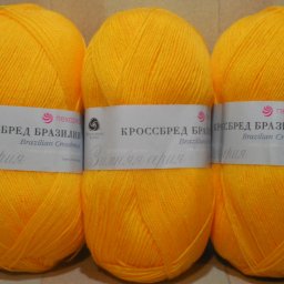 Желтый пуловер спицами.