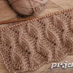 Интересный узор спицами.