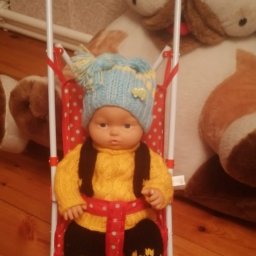 Связала внучатам.