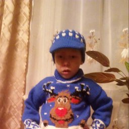 Связала внучатам.