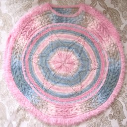 Пончо-звезда по кругу спицами и крючком.