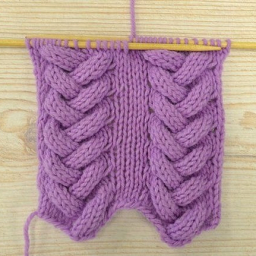 Оригинальное вязание кос спицами.